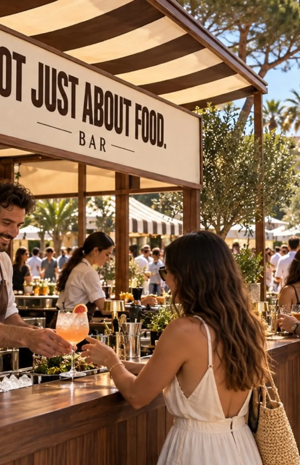 A guest receiving a cocktail at the festival bar.